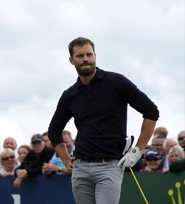 July 5th 2017, Portstewart Golf Club, Portstewart, Northern Ireland; Dubai Duty Free Irish Open Golf Championship; Pro-Am Tournament; The face says it all as actor Jamie Dornan hits his first tee shot into the rough xNigelxCookex  ActionPlus11897959