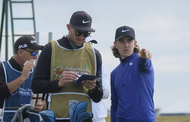 July 6th 2017, Portstewart Golf Club, Portstewart, Northern Ireland; Dubai Duty Free Irish Open Golf Championship; Day 1; Tommy Fleetwood (ENG) discusses the 10th tee shot with his caddy xNigelxCookex  ActionPlus11898243