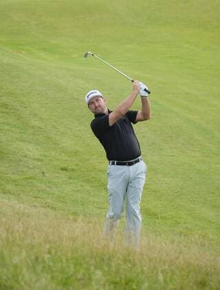 July 6th 2017, Portstewart Golf Club, Portstewart, Northern Ireland; Dubai Duty Free Irish Open Golf Championship; Day 1; Graeme McDowell (NIR) plays his second shot from the 10th to the green xNigelxCookex  ActionPlus11898247