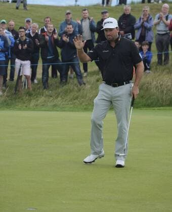 July 6th 2017, Portstewart Golf Club, Portstewart, Northern Ireland; Dubai Duty Free Irish Open Golf Championship; Day 1; Graeme McDowell (NIR) thanks the crowd on the 16th green after his putt xNigelxCookex  ActionPlus11898268