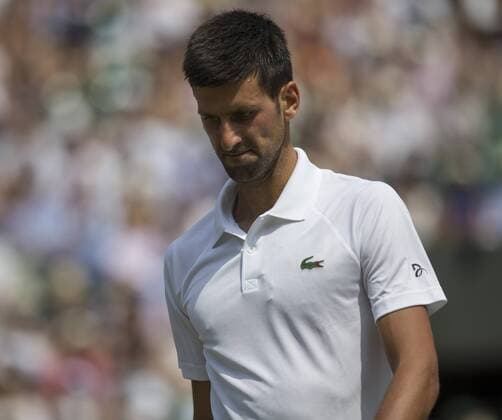 July 6th 2017, All England Lawn Tennis and Croquet Club, London, England; The Wimbledon Tennis Championships, Day 4; Novak Djokovic (SRB) walks to his seat after winning the set against Adam Pavlasek (CZE) xRolandxHarrisonx  ActionPlus11898339