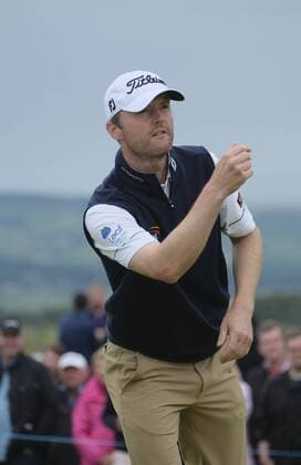 July 6th 2017, Portstewart Golf Club, Portstewart, Northern Ireland; Dubai Duty Free Irish Open Golf Championship; Day1; Michael Hoey (ENG) throws his ball to a young fan after making a birdie putt on the 16th xNigelxCookex  ActionPlus11898431