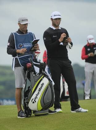 July 6th 2017, Portstewart Golf Club, Portstewart, Northern Ireland; Dubai Duty Free Irish Open Golf Championship; Day1; John Rahm (ESP) discuses his approach shot with his caddy xNigelxCookex  ActionPlus11898440