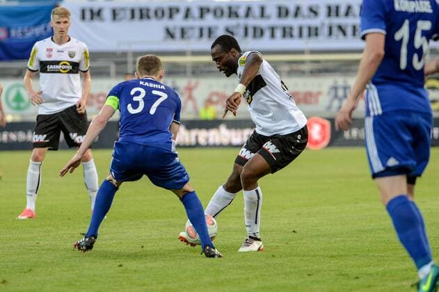 SOCCER - UEFA EL quali, Altach vs Chikhura ALTACH,AUSTRIA,06.JUL.17 - SOCCER - UEFA Europa League qualification, SCR Altach vs FC Chikhura Sachkhere. Image shows Shota Kashia (Chikhura) and Louis Clement Ngwat Mahop (Altach). GEPAxpictures xOliverxLerch