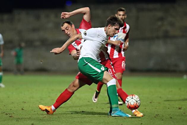 Hibernians Stadium, Paola, Malta UEFA Europa League 2017 2018 First Qualifying Round, Second Leg Floriana FC v FK Crvena Zvezda Luka Ilic (L) of FK Crvena Zvezda (Red Star Belgrade) is challenged by Sebastaiano Nayar of Floriana FC (R) during of the UEFA Europa League, first qualifying round, second leg match against Floriana FC at the Hibernians Stadium in Paola, Malta on 06 July, 2017. UEFA Europa League 2017 2018 - Floriana FC v FK Crvena Zvezda UEL_1QR_2LG_FLO_RSB
