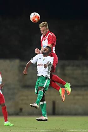 Hibernians Stadium, Paola, Malta UEFA Europa League 2017 2018 First Qualifying Round, Second Leg Floriana FC v FK Crvena Zvezda Uros Rachic (top) of FK Crvena Zvezda (Red Star Belgrade) heads first ahead of Arthur Henrique of Floriana FC (down) during of the UEFA Europa League, first qualifying round, second leg match against Floriana FC at the Hibernians Stadium in Paola, Malta on 06 July, 2017. UEFA Europa League 2017 2018 - Floriana FC v FK Crvena Zvezda UEL_1QR_2LG_FLO_RSB
