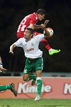 Hibernians Stadium, Paola, Malta UEFA Europa League 2017 2018 First Qualifying Round, Second Leg Floriana FC v FK Crvena Zvezda Slavoljub Srnic (top) of FK Crvena Zvezda (Red Star Belgrade) is challenged by Arthur Henrique of Floriana FC (down) during of the UEFA Europa League, first qualifying round, second leg match against Floriana FC at the Hibernians Stadium in Paola, Malta on 06 July, 2017. UEFA Europa League 2017 2018 - Floriana FC v FK Crvena Zvezda UEL_1QR_2LG_FLO_RSB