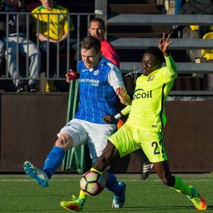 (170707) -- VILNIUS, July 7, 2017 -- Alma Wakili (R) of FK Trakai vies with Blair Alston of St. Johnstone during the UEFA Europa League first qualifying round second leg game between FK Trakai and St. Johnstone in Vilnius, Lithuania, on July 6, 2017. FK Trakai won 1-0. ) (SP)LITHUANIA-VILNIUS-SOCCER-EUROPA LEAGUE QUALIFIER-FK TRAKAI VS ST. JOHNSTONE AlfredasxPliadis 