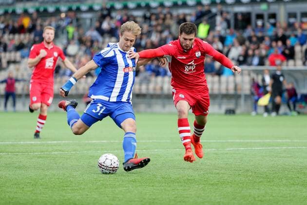 Akseli Pelvas of HJK Helsinki scores 2-0 goal over Kai Edwards of Nomads FC during Europa League round 1 qualifying match HJK vs Connah s Quay Nomads FC at Telia 5G Stadium in Helsinki Finland on 6th July 2017. Matti Raivio All Over Press  MR016940