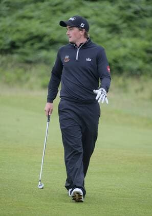 July 7th 2017, Portstewart Golf Club, Portstewart, Northern Ireland; Dubai Duty Free Irish Open Golf Championship, Day 2; Paul Dunne (IRE) walks the 11th fairway during the second round of the Dubai Duty Free Irish Open xNigelxCookex  ActionPlus11898545