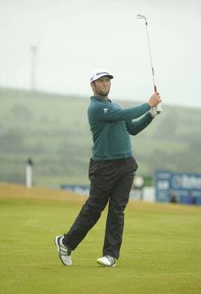 July 7th 2017, Portstewart Golf Club, Portstewart, Northern Ireland; Dubai Duty Free Irish Open Golf Championship, Day 2; John Rahm (USA) plays his second shot on the 18th during the second round of the Dubai Duty Free Irish Open xNigelxCookex  ActionPlus11898560
