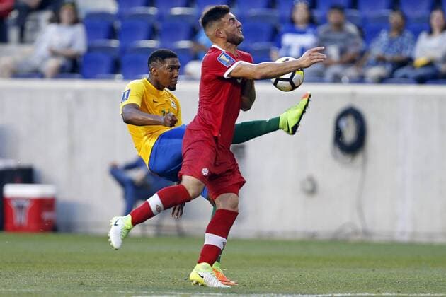 French Guiana defender Gregory Lescot kicks the ball in front of Canada forward Lucas Cavallini during the first half of a CONCACAF Gold Cup soccer match at Red Bull arena in Harrison, NJ, USA, on 7 July 2017. French Guiana vs Canada !ACHTUNG: NUR REDAKTIONELLE NUTZUNG!  Copyright: xAdamxHungerx ADA07 20170708-636350763827369129