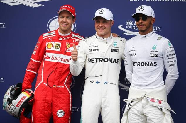 FORMULA 1 - GP of Austria 2017 SPIELBERG,AUSTRIA,08.JUL.17 - MOTORSPORTS, FORMULA 1 - Grand Prix of Austria, Red Bull Ring, qualifying. Image shows the rejoicing of Sebastian Vettel (GER Ferrari), Valtteri Bottas (FIN Mercedes) and Lewis Hamilton (GBR Mercedes). GEPAxpictures xDanielxGoetzhaber