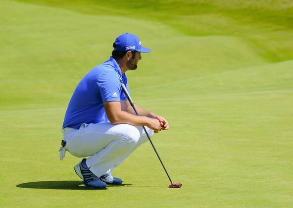 July 8th 2017, Portstewart Golf Club, Portstewart, Northern Ireland; Dubai Duty Free Irish Open Golf Championship, Day 3; John Rahm (USA) studies the green on the 4th during the third round of the Dubai Duty Free Irish Open; Rahm presently holds the lead towards the end of the 3rd round xNigelxCookex  ActionPlus11898985