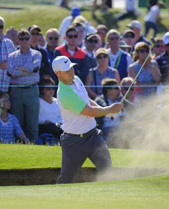 July 8th 2017, Portstewart Golf Club, Portstewart, Northern Ireland; Dubai Duty Free Irish Open Golf Championship, Day 3; Oliver Fisher (ENG) chips out of the 18th green bunker during the third round of the Dubai Duty Free Irish Open xNigelxCookex  ActionPlus11899102
