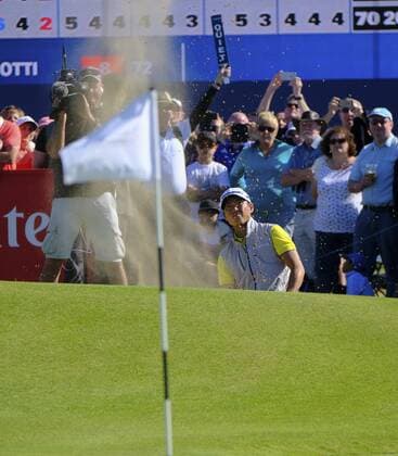 July 8th 2017, Portstewart Golf Club, Portstewart, Northern Ireland; Dubai Duty Free Irish Open Golf Championship, Day 3; Daniel Im (USA) chips out of the bunker on the 18th green during the third round of the Dubai Duty Free Irish Open as he takes the joint lead into round 4 xNigelxCookex  ActionPlus11899111