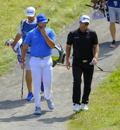 July 8th 2017, Portstewart Golf Club, Portstewart, Northern Ireland; Dubai Duty Free Irish Open Golf Championship, Day 3; John Rahm (ESP) on the left and Ryan Fox (NZL) make their way to the 3rd green during the third round of the Dubai Duty Free Irish Open xNigelxCookex  ActionPlus11899156