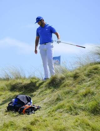July 8th 2017, Portstewart Golf Club, Portstewart, Northern Ireland; Dubai Duty Free Irish Open Golf Championship, Day 3; John Rahm (ESP) looks for his ball in the rough on the 4th during the third round of the Dubai Duty Free Irish Open xNigelxCookex  ActionPlus11899160
