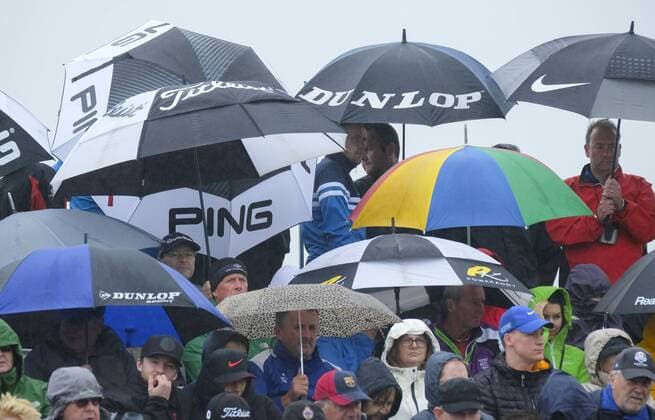 July 9th 2017, Portstewart Golf Club, Portstewart, Northern Ireland; Dubai Duty Free Irish Open Golf Championship, Day 4; The umbrellas are up as the rain arrives during the final round of the Dubai Duty Free Irish Open xNigelxCookex  ActionPlus11899435