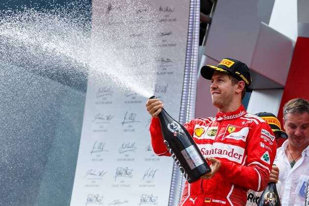 Sebastian Vettel (Scuderia Ferrari) spritzt mit Champagner vom Podium, Grosser Preis von Oesterreich 2017, Motorsport, Formel 1, 09.07.2017, Spielberg Copyright: xNeis Eibner-Pressefotox EP_ANS
