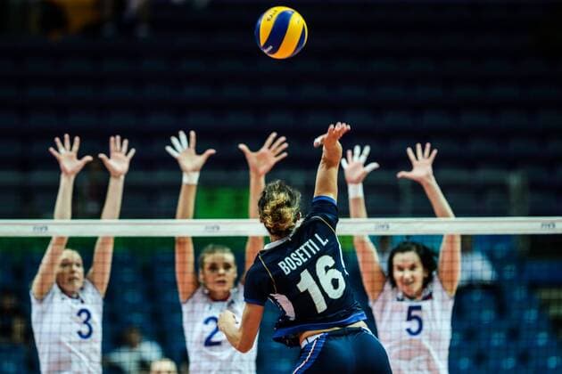 Lucia Bosetti, front, of Italy tries to block a spike by Irina Filishtinskaia, Ekaterina Efimova, and Iuliia Kutiukova of Russia during the Pool B1-Group 1 match of the FIVB World Grand Prix 2017 in Kunshan city, east China s Jiangsu province, 9 July 2017. Italy defeated Russia 3-2. Italy beats Russia 3-2 at 2017 FIVB World Grand Prix in east China  20170709_80373