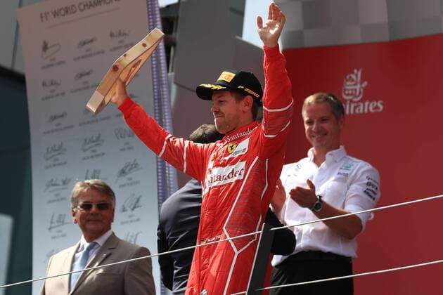 July 9th 2017, Red Bull Ring, Spielberg, Austria; Formula One Grand Prix, Race Day; Sebastian Vettel - Scuderia Ferrari SF70H holds up his triphy as he comes 2nd xOctanex  ActionPlus11899501