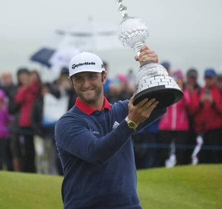 July 9th 2017, Portstewart Golf Club, Portstewart, Northern Ireland; Dubai Duty Free Irish Open Golf Championship, Day 4; Jon Rahm (ESP) celebrates with the trophy on the 18th green after winning the tournament with a score of 24 under par xNigelxCookex  ActionPlus11899696