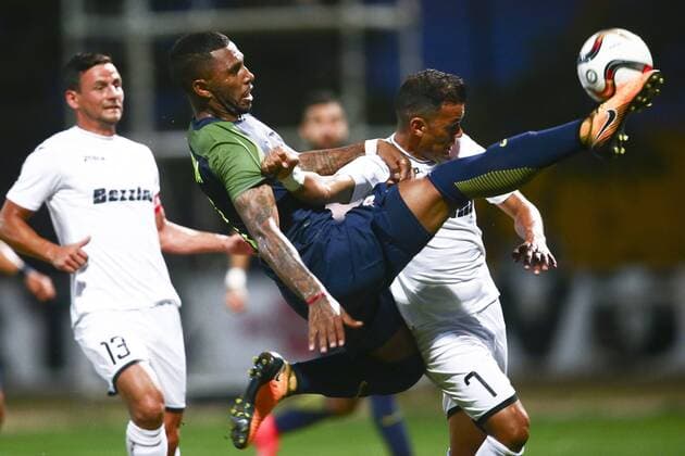 SOCCER - CL, qualification, Hibernians vs RBS PAOLA,MALTA,11.JUL.17 - SOCCER - UEFA Champions League, qualification, FC Hibernians vs Red Bull Salzburg. Image shows Paulo Miranda (RBS) and Jackson Lima (Hibernians). GEPAxpictures xFelixxRoittner