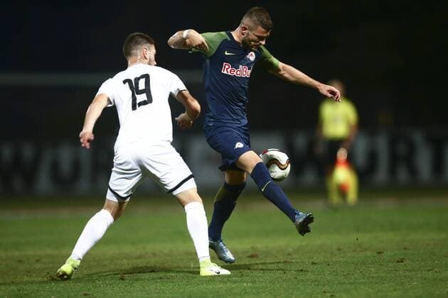 SOCCER - CL, qualification, Hibernians vs RBS PAOLA,MALTA,11.JUL.17 - SOCCER - UEFA Champions League, qualification, FC Hibernians vs Red Bull Salzburg. Image shows Johan Bezzina (Hibernians) and Valon Berisha (RBS). GEPAxpictures xFelixxRoittner