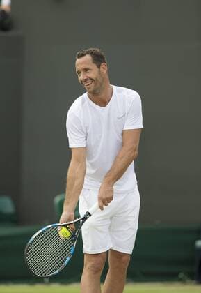July 13th 2017, All England Lawn Tennis and Croquet Club, London, England; The Wimbledon Tennis Championships, Day 10; Michael Llordra (FRA) serving during his match with Monsour Bahrami (IRI) against Greg Rusedski (GBR) and Fabrice Santoro (FRA) xRolandxHarrisonx  ActionPlus11900841