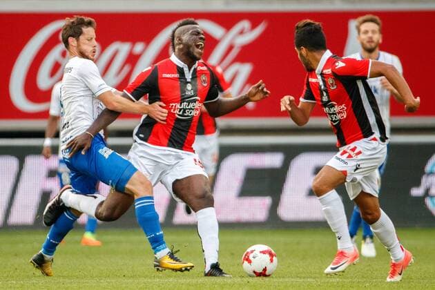 Gent s Thomas Matton and Nice s Mario Balotelli fight for the ball during a friendly soccer match between Belgian first league soccer team KAA Gent and French Ligue 1 team Nice, Thursday 13 July 2017 in Gent. KURTxDESPLENTER  x05131033x