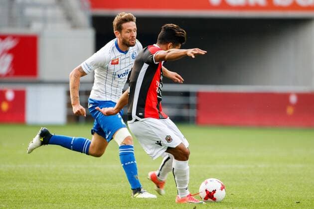 Gent s Damien Marcq and Nice s Bassem Srarfi fight for the ball during a friendly soccer match between Belgian first league soccer team KAA Gent and French Ligue 1 team Nice, Thursday 13 July 2017 in Gent. KURTxDESPLENTER  x05131038x