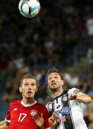 SOCCER - UEFA EL quali, Sturm vs Podgorica GRAZ,AUSTRIA,13.JUL.17 - SOCCER - UEFA Europa League qualification, SK Sturm Graz vs FK Mladost Podgorica. Image shows Zoran Petrovic (Podgorica) and Christian Schulz (Sturm). GEPAxpictures xChristianxWalgram