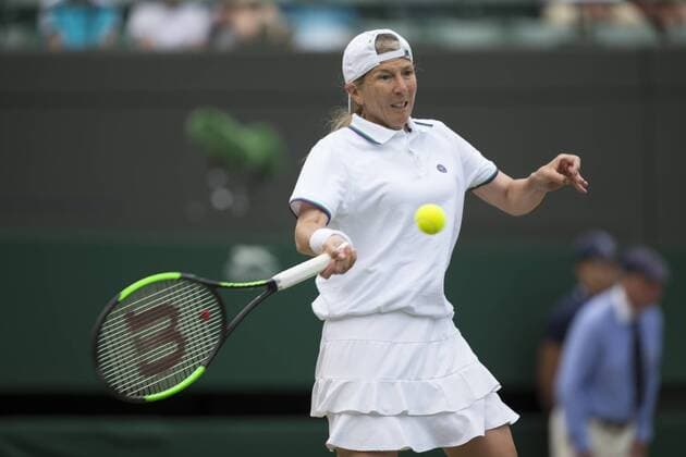 July 13th 2017, All England Lawn Tennis and Croquet Club, London, England; The Wimbledon Tennis Championships, Day 10; Andrea Jaeger (USA) hits a forehand return during her match with Conchita Martinez (ESP) against Martina Navratilova (USA) and Cara Black (ZIM) xRolandxHarrisonx  ActionPlus11900969
