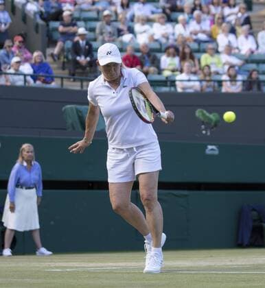 July 13th 2017, All England Lawn Tennis and Croquet Club, London, England; The Wimbledon Tennis Championships, Day 10; Martina Navratilova (USA) hits a backhand return during her match with Cara Black (ZIM) against Andrea Jaeger (USA) and Conchita Martinez ESP) xRolandxHarrisonx  ActionPlus11900974