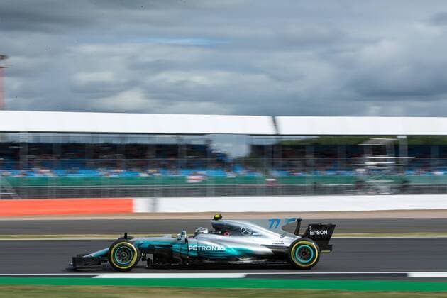 July 14th 2017, Silverstone, Northamptonshire, England; British Formula One Grand Prix, Free Practice; Mercedes AMG Petronas Motorsport driver Valtteri Bottas speeds past the grandstands xTimxWilliamsx  ActionPlus11901097