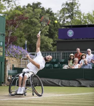 July 14th 2017, All England Lawn Tennis and Croquet Club, London, England; The Wimbledon Tennis Championships, Day 11; Stefan Olsson (SWE) serving to Shingo Kunieda (JPN) during their match xRolandxHarrisonx  ActionPlus11901152