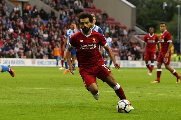 July 14th 2017, DW Stadium, Wigan, Lancashire; Pre-season football, Wigan Athletic FC versus Liverpool FC Mohammed Salah of Liverpool cuts into the Wigan penalty area with the ball xDavidxBlunsdenx  ActionPlus11901396