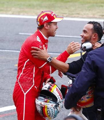 Bilder des Tages - SPORT Motorsports: FIA Formula One World Championship WM Weltmeisterschaft 2017, Grand Prix of Great Britain, 5 Sebastian Vettel (GER, Scuderia Ferrari), Nicolas, brother of 44 Lewis Hamilton (GBR, Mercedes AMG Petronas F1 Team), Silverstone Great Britain xHOCHxZWEIx
