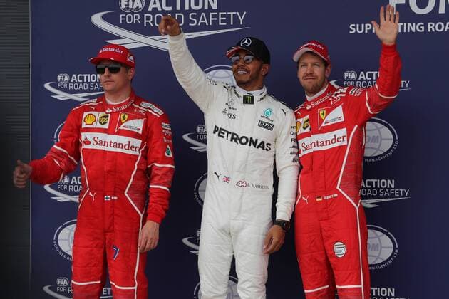 British Grand Prix, Silverstone 13 - 16 July 2017 15.07.2017 - Qualifying, 2nd place Kimi Raikkonen (FIN) Scuderia Ferrari SF70H, Lewis Hamilton (GBR) Mercedes AMG F1 W08 pole position and 3rd place Sebastian Vettel (GER) Scuderia Ferrari SF70H 