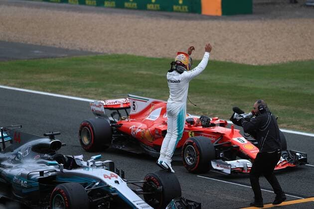 July 15th 2017, Silverstone, Northamptonshire, England; British Formula One Grand Prix, qualification sessions day; Lewis Hamilton - Mercedes AMG Petronas F1 W08 EQ Energy+ takes pole as Vettel pulls into the parking xOctanex  ActionPlus11901763