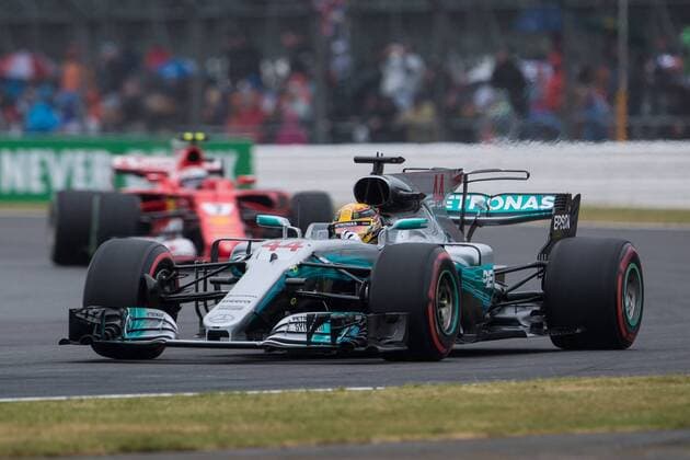 July 15th 2017, Silverstone, Northamptonshire, England; British Formula One Grand Prix, qualification sessions day; Pole man Mercedes AMG Petronas Motorsport driver Lewis Hamilton ahead of Scuderia Ferrari driver Kimi Raikkonen in qualifying xTimxWilliamsx  ActionPlus11902063