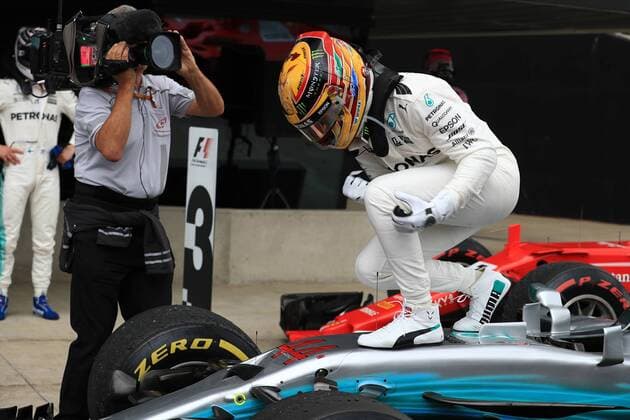 July 16th 2017, Silverstone, Northamptonshire, England; British Formula 1 Grand Prix, Race Day; Lewis Hamilton - Mercedes AMG Petronas F1 W08 EQ Energy+ wins the British GP and celebrates on his car in parc ferme xOctanex  ActionPlus11902466