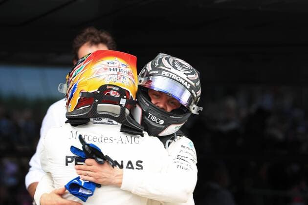 July 16th 2017, Silverstone, Northamptonshire, England; British Formula 1 Grand Prix, Race Day; Lewis Hamilton - Mercedes AMG Petronas F1 W08 EQ Energy+ wins the British GP hugs team mate Valtteri Bottas who was 2nd xOctanex  ActionPlus11902473