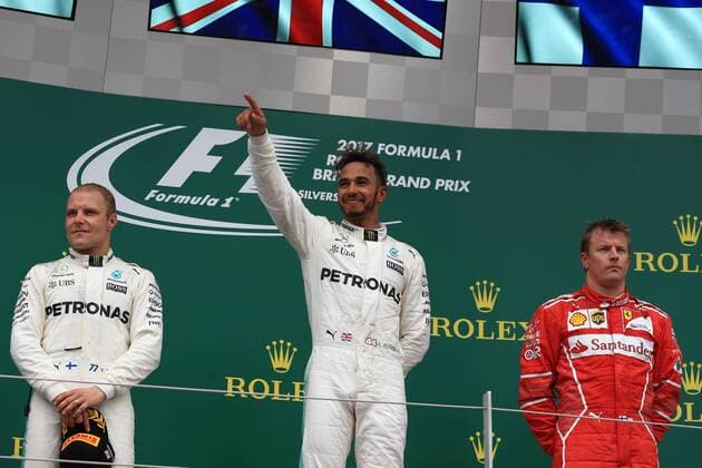 July 16th 2017, Silverstone, Northamptonshire, England; British Formula 1 Grand Prix, Race Day; Lewis Hamilton - Mercedes AMG Petronas F1 W08 EQ Energy+ wins the British GP followed by team mate Valtteri Bottas and in 3rd Kimi Raikkonen - Scuderia Ferrari SF70H xOctanex  ActionPlus11902492