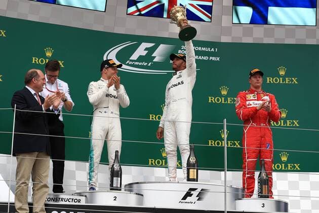 July 16th 2017, Silverstone, Northamptonshire, England; British Formula 1 Grand Prix, Race Day; Lewis Hamilton - Mercedes AMG Petronas F1 W08 EQ Energy+ wins the British GP followed by team mate Valtteri Bottas and in 3rd Kimi Raikkonen - Scuderia Ferrari SF70H xOctanex  ActionPlus11902495