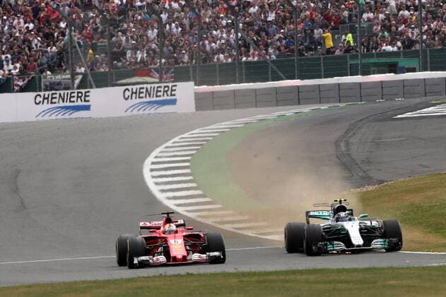 British Grand Prix, Silverstone 13 - 16 July 2017 16.07.2017 - Race, Sebastian Vettel (GER) Scuderia Ferrari SF70H and Valtteri Bottas (FIN) Mercedes AMG F1 W08 