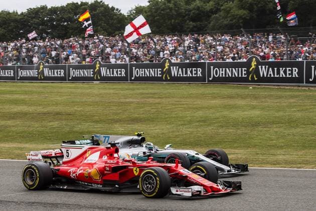 Motorsports: FIA Formula One World Championship WM Weltmeisterschaft 2017, Grand Prix of Great Britain, 5 Sebastian Vettel (GER, Scuderia Ferrari), 77 Valtteri Bottas (FIN, Mercedes AMG Petronas F1 Team), Silverstone Great Britain xHOCHxZWEIx