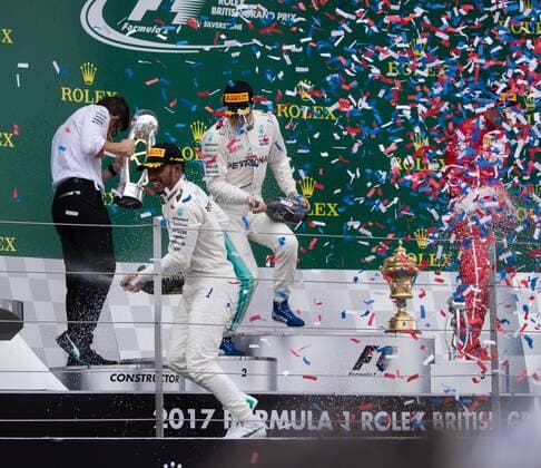 July 16th 2017, Silverstone, Northamptonshire, England; British Formula 1 Grand Prix, Race Day; Mercedes AMG Petronas Motorsport driver Lewis Hamilton sprays the champagne as the streamers fly xTimxWilliamsx  ActionPlus11902601