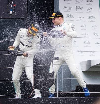 July 16th 2017, Silverstone, Northamptonshire, England; British Formula 1 Grand Prix, Race Day; Mercedes AMG Petronas Motorsport driver Lewis Hamilton and Mercedes AMG Petronas Motorsport driver Valtteri Bottas spray the champagne xTimxWilliamsx  ActionPlus11902602